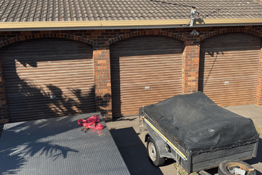 should i try to fix my garage door myself